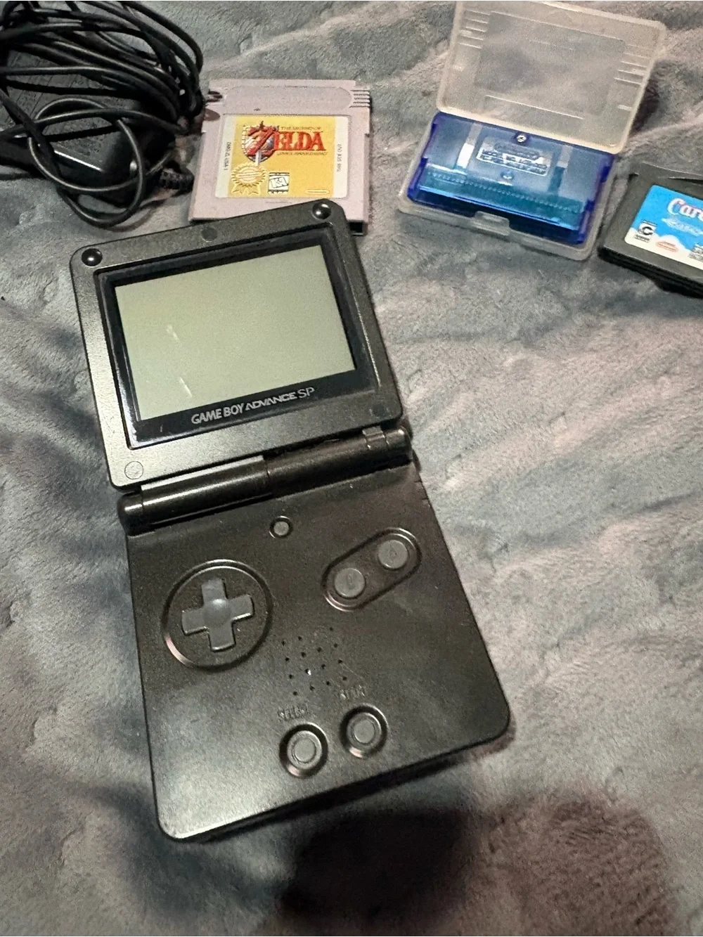 Nintendo Game Boy Advance SP Black with Pokémon sapphire, Zelda, Care Bears